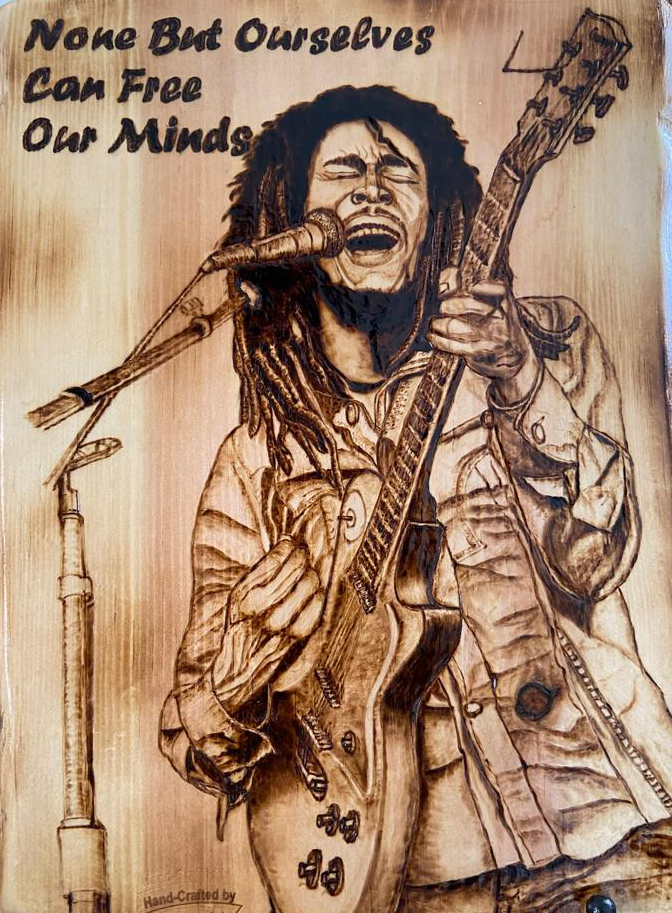 Top African pyrography artist creating custom wood burning art in Paris, Lyon, Bordeaux, Marseille, Toulouse, and Vienna