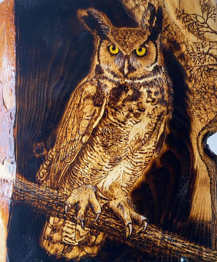 Best African pyrography artist creating custom wood burning art in Zürich, Bern, Geneva, Lausanne, and Vienna
